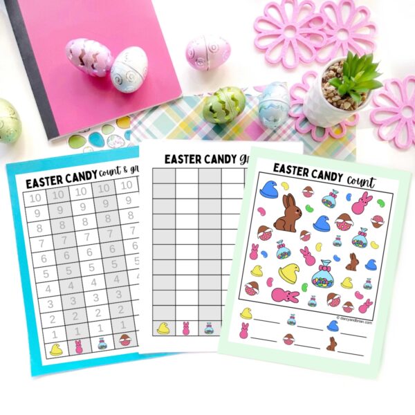 Mockup of Easter Candy count and graph worksheets spread out on a white table decorated with pink flowers and Easter eggs.
