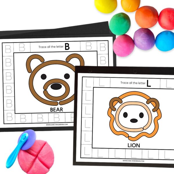 Two printable mats for shaping playdough and tracing letters overlapping on a white background. Animals are bear and lion. Assorted colors of playdough rolled in balls at the top. A playdough cutter made marks in some pink dough.